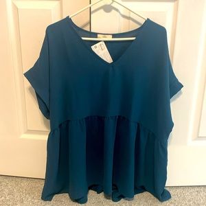 Short sleeve teal blouse